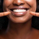 close up of woman with pearly white teeth